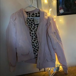 pink jacket with fury cheetah print inside